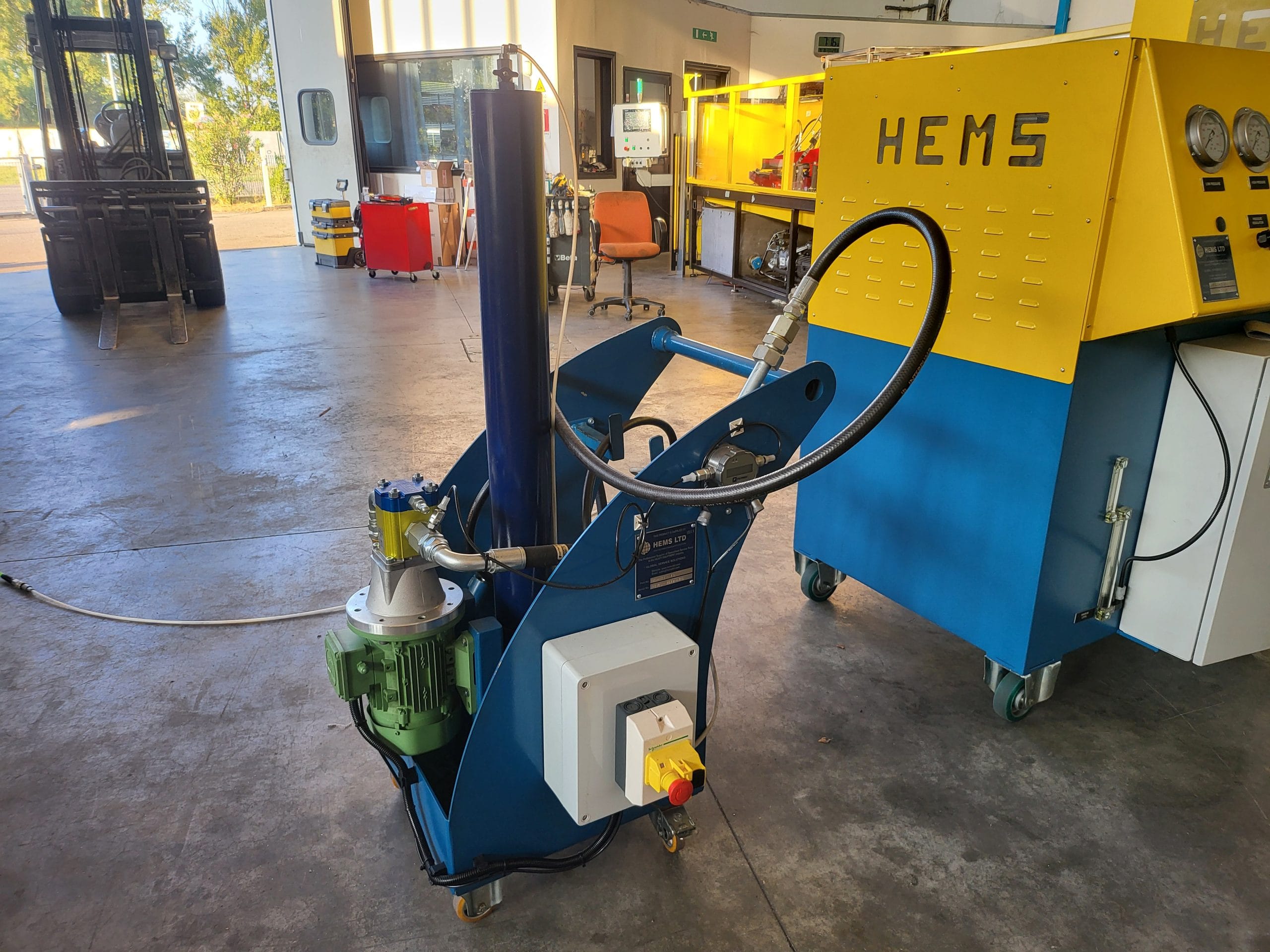 HE-MF-40 Oil Filtration Unit in HEMS Warehouse next to the PHT-415 Cylinder Tester